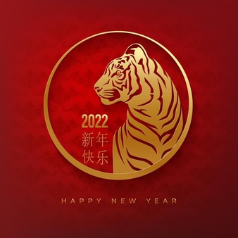 Happy new year background with clouds and golden tiger carved in circle medallion on a red backdrop