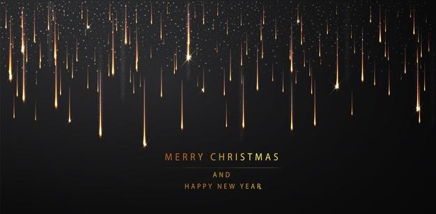 Merry christmas and happy new year background. shimmering golden particles on a dark background. abstract holiday background.