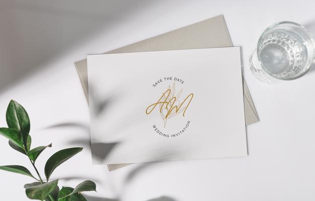 Mockup white greeting card with envelope and flower.